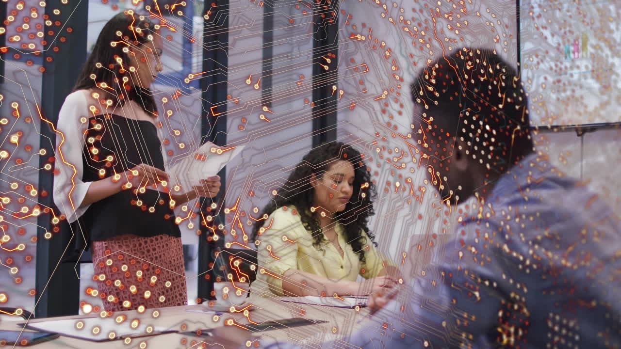 Animation of computer circuit board over diverse people at office
