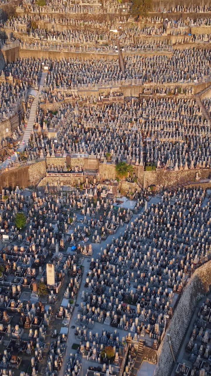 Aerial drone view of the Higashi Otani Cemetery in Kyoto, Japan in daylight