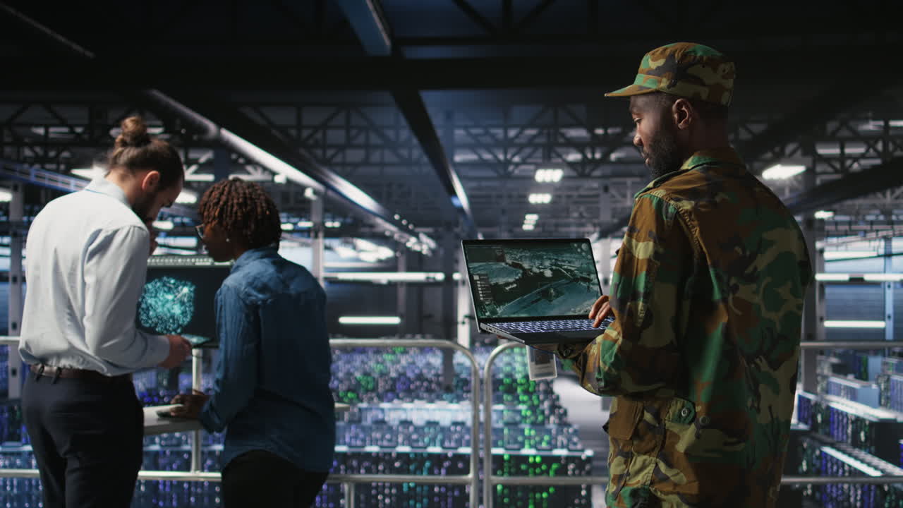 Soldier in server room uses geospatial data to support emergency operations