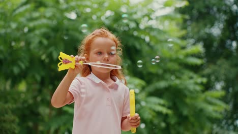 child playing with bubbles