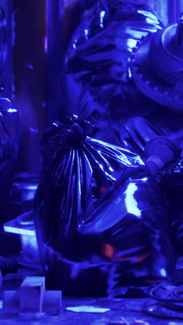 close-up of garbage bags under blue light