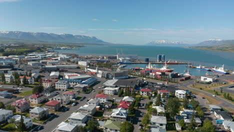 Aerial-top-view-of-old-harbor-near-Reykjavik-city-centre-and-downtown-neighborhood.-Birds-eye-panoramic-view-of-Iceland-capital-city-with-colorful-rooftops-and-coastline.-Wanderlust
