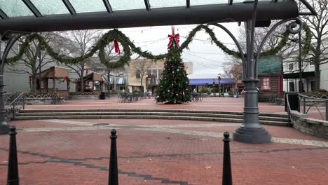 christmas tree in downtown northville, michigan with drone video moving in