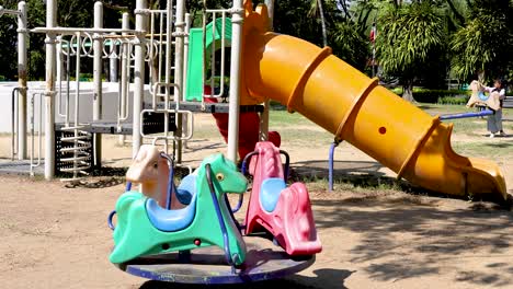 kids enjoying playground activities in bangkok park