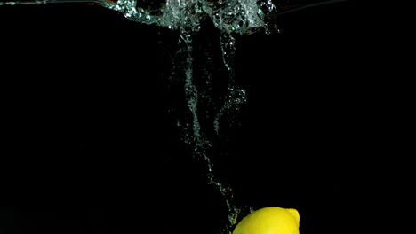 lemon falling in water