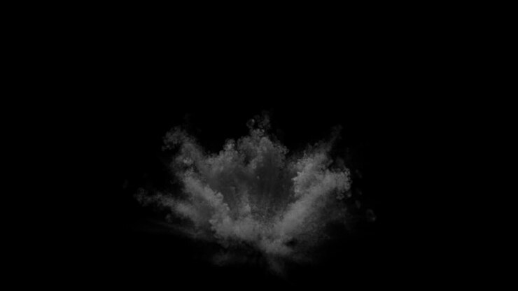Esplosione di polvere grigia su sfondo nero
