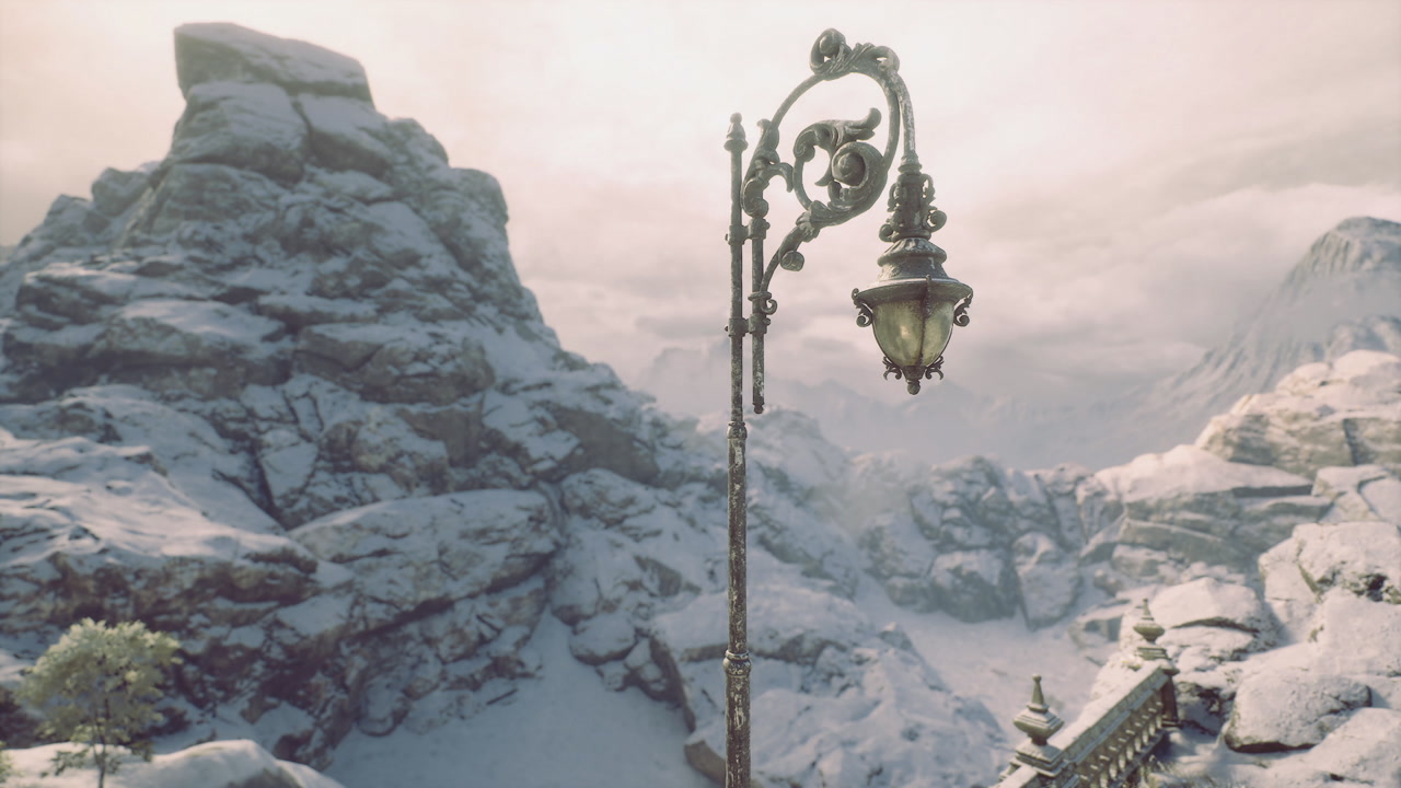 Lamp post stands tall in a snowy mountain landscape at dusk