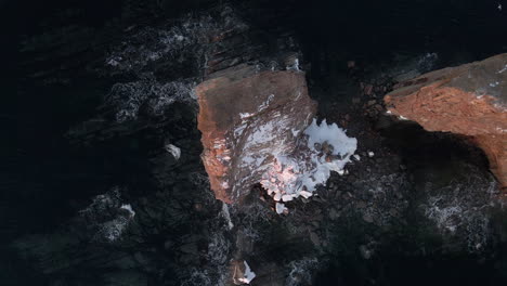 cinematic drone shot of famous perce rock in quebec, canada