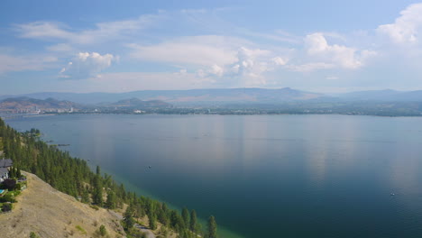 aerial view across the okanagan lake from west kelowna on a beautiful, cloudy day