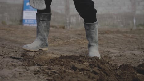 man making a hole in the ground