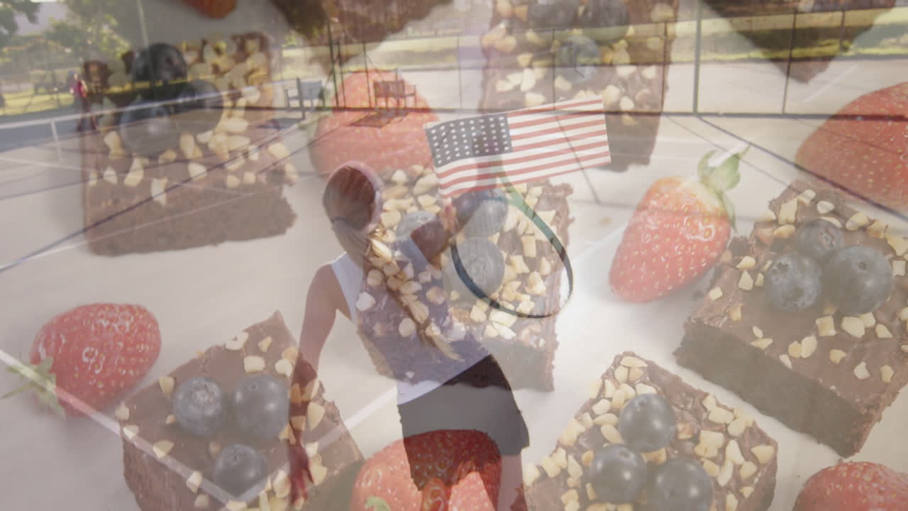 Dancing outdoors, person with animation of American flag and berries overlay