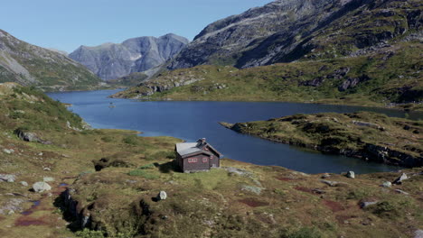 norwegian mountain cabin by a fjord lake