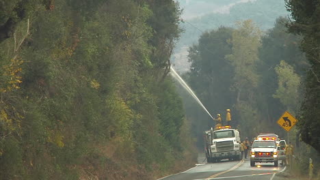 Firefighters-Water-Down-A-Hillside-Near-Ojai-California-During-The-Thomas-Fire