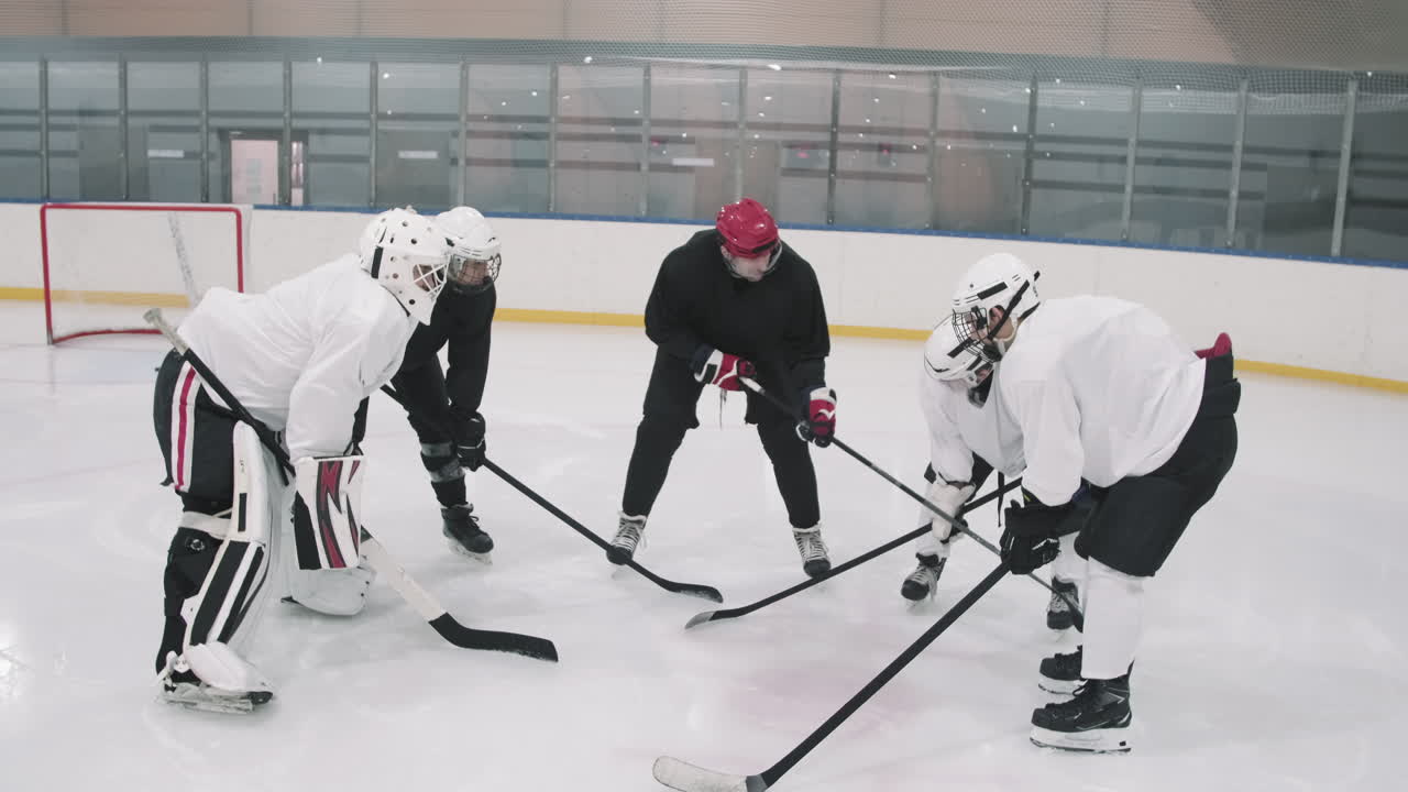 Hockey Players With Coach At Training
