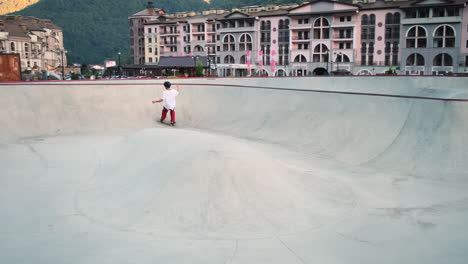 skateboarding at a skatepark with mountain view