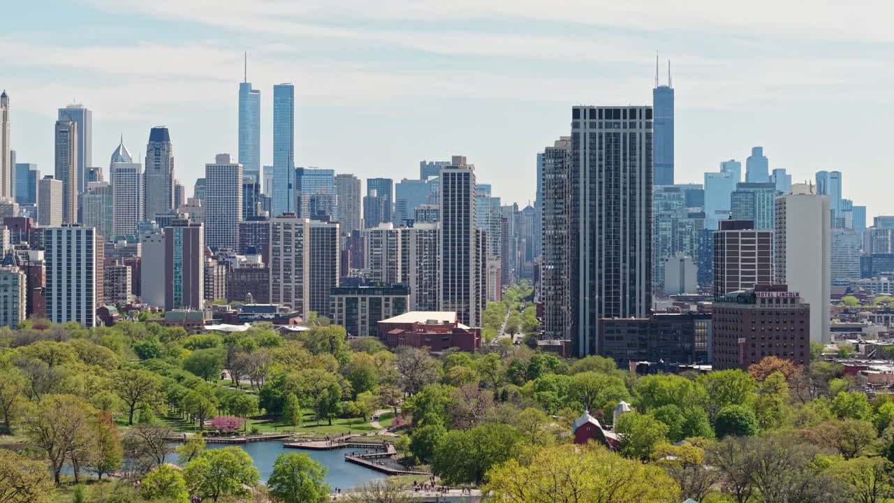 Chicago Downtown Cityscape Skyline, Establishing Drone Shot From Lincoln Park on Sunny Summer Day
