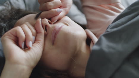 woman waking up in bed