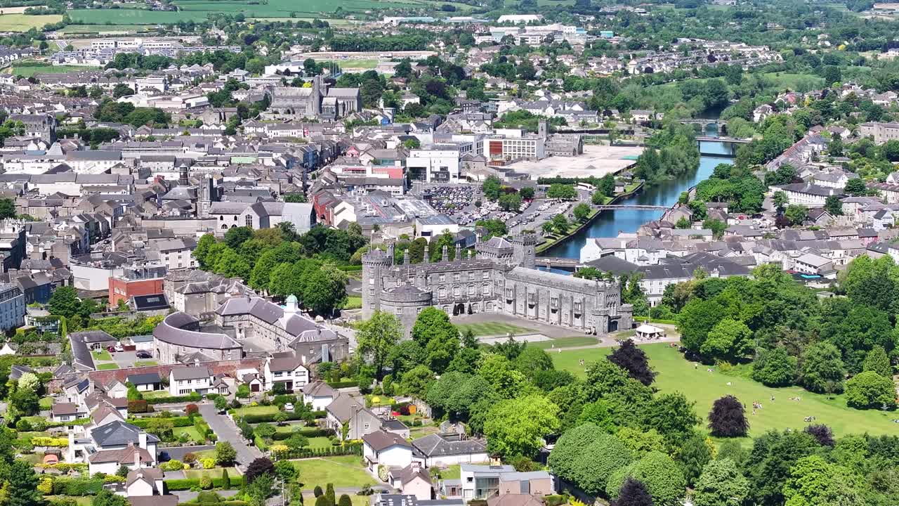 Kilkenny drone cityscape with Castle in the middle. Sunny weather in Ireland, travel.