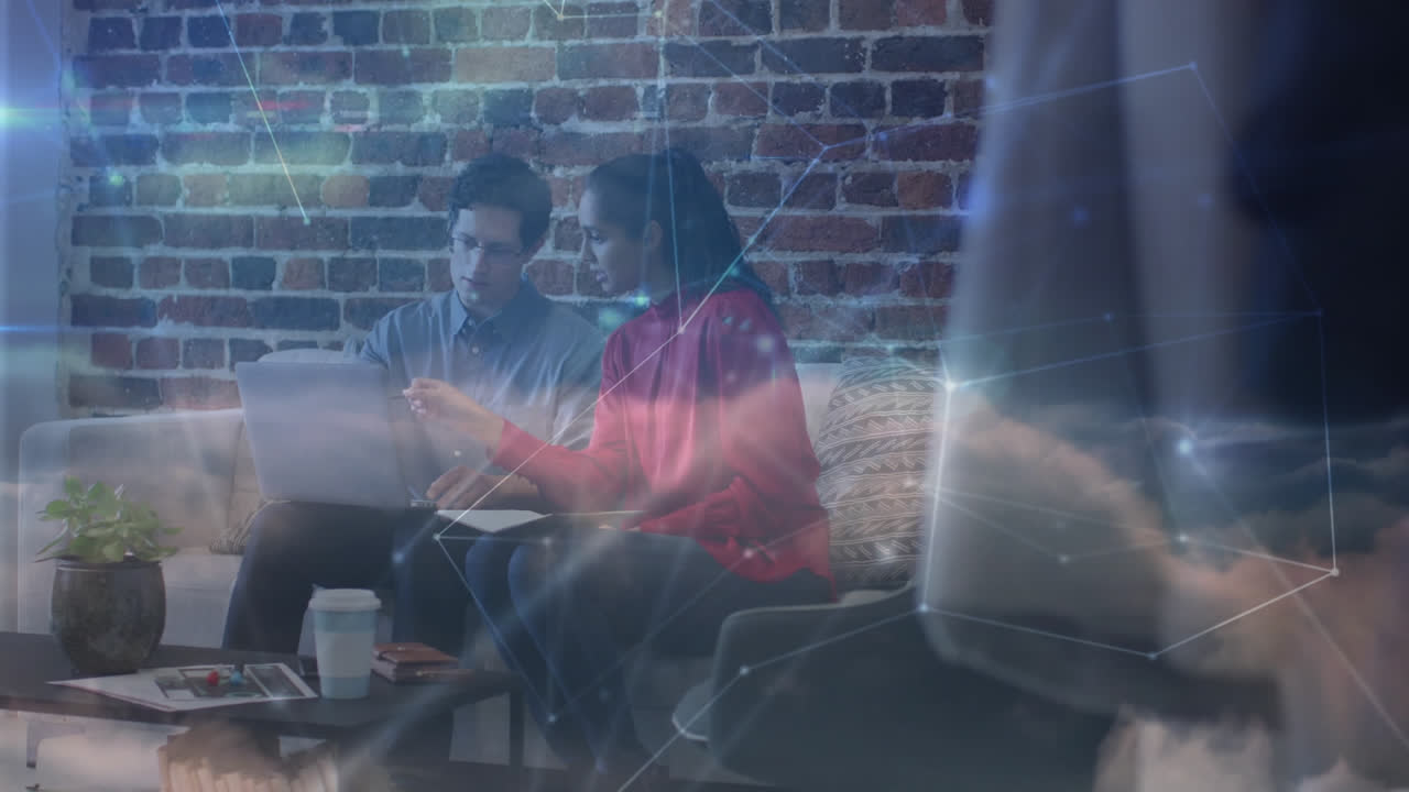 Animation of network of connections over business people in office