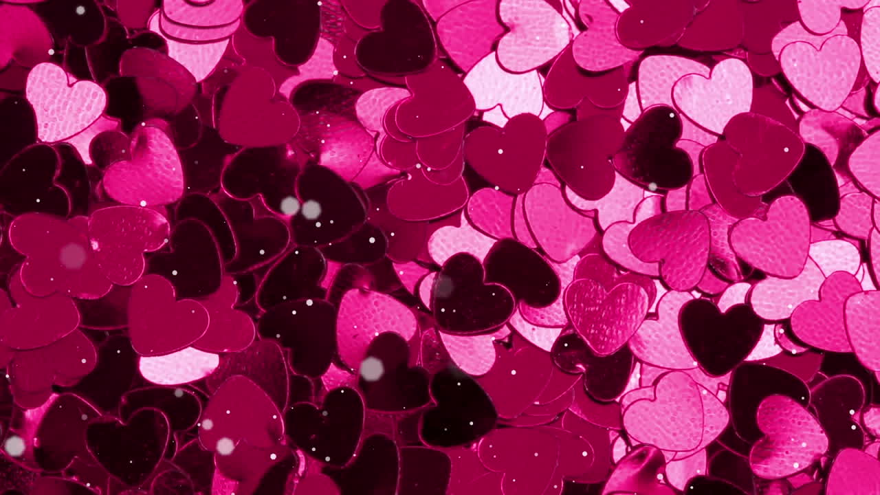 Animation of multiple flickering pink hearts