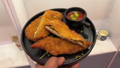 crispy chicken cutlet served in a restaurant in kolkata.