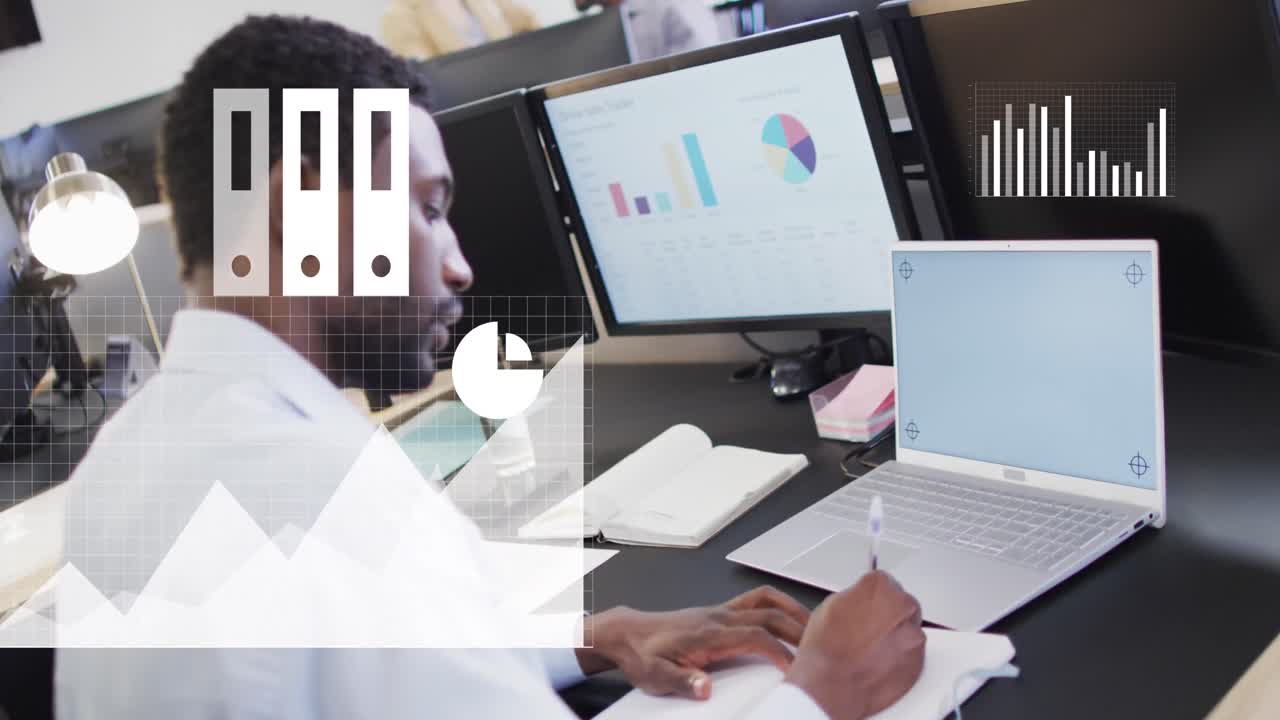 Animation of data processing over african american businessman using computer in office