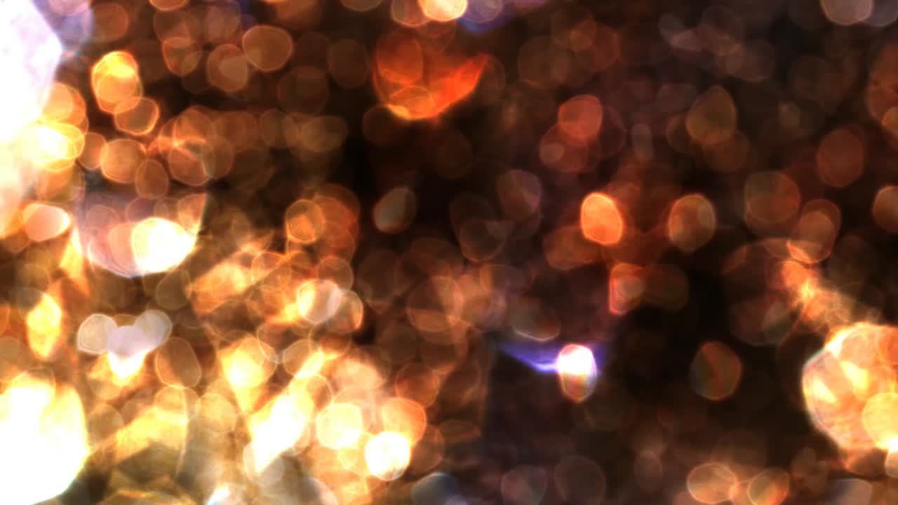 bokeh ondulado en movimiento con colores rojos marrones - animación de fondo de movimiento de bucle sin costuras de 4k