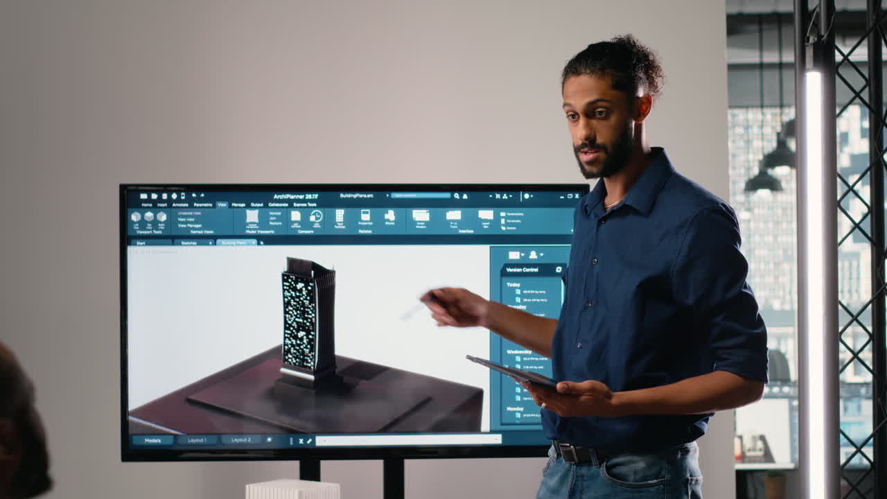 Vertical Video Middle eastern urban developer presenting blueprints master plan to colleagues