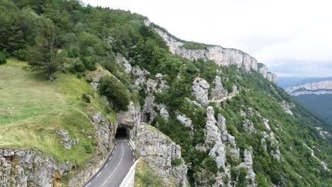 drone shot of tunnel in the mountains of france