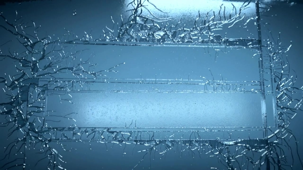Spreading filaments, shards across central panel with recessed band from edge stress