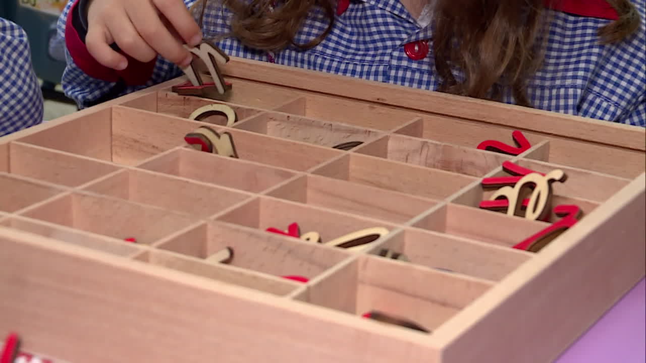 Children learning the alphabet and numbers