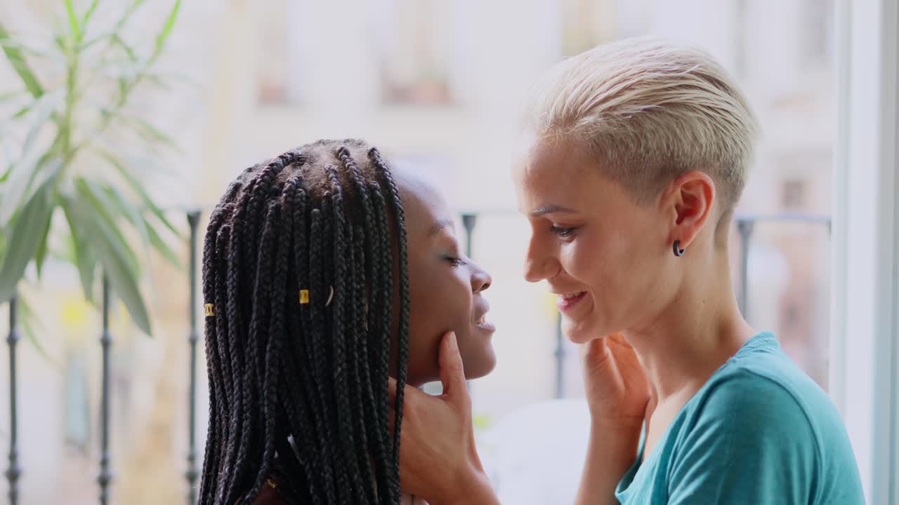 Affectionate and intimate moment between two diverse young women