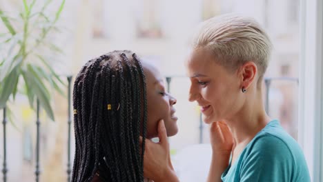 affectionate and intimate moment between two diverse young women
