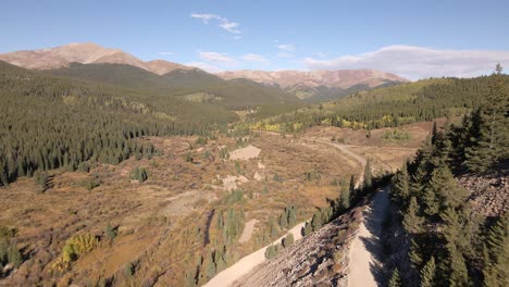 Flying-past-a-dirt-road-on-a-steep