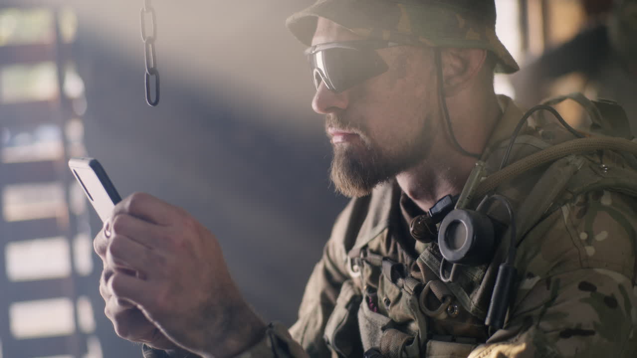Soldier using smartphone