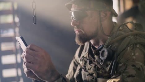 soldier using smartphone