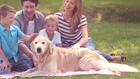 family with dog in the park