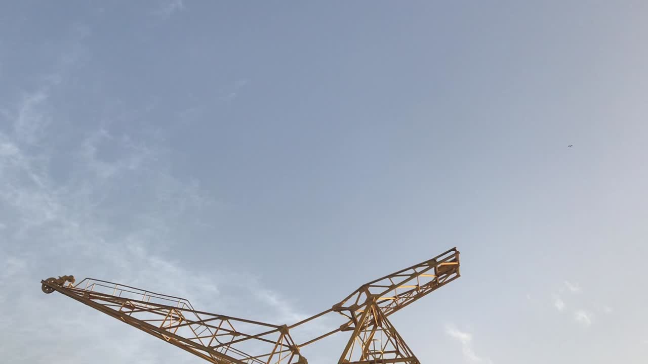 Gigantic and magnificent construction yellow crane