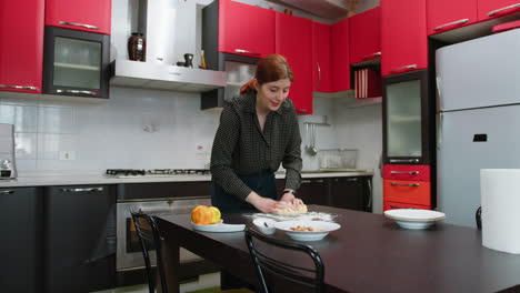 young woman prepares dough for healthy homemade cakes