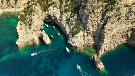 tourists sailing into grotta verde on the italian island capri on a sunny day