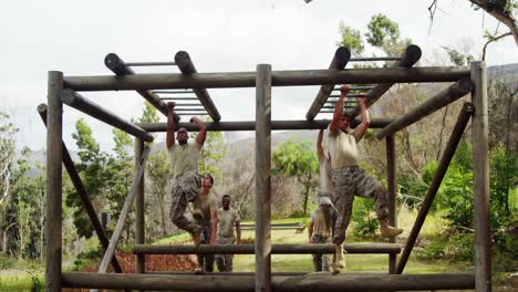 military soldiers climbing monkey bars 4k