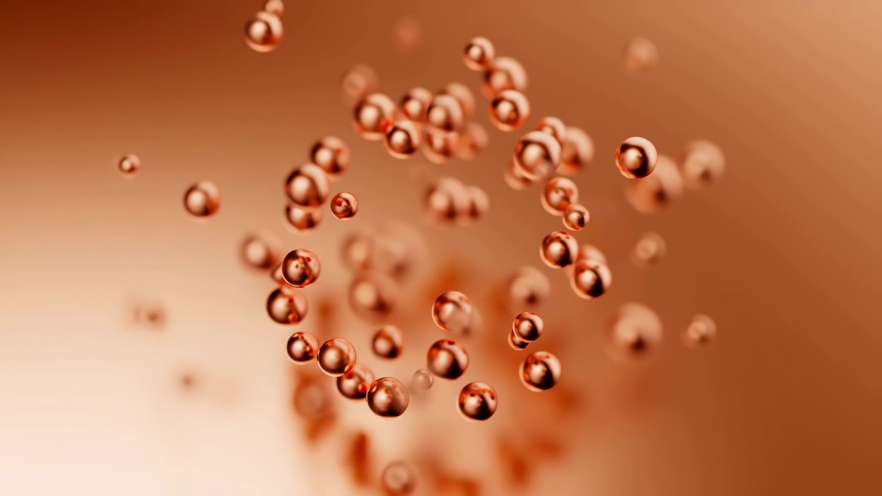 Scena astratta ravvicinata con sfere di rame lucidato che si riorganizzano in formazioni a nuvola e ad anello su uno sfondo sfumato caldo e sfocato, creando riflessi morbidi, profondità, spazio negativo e