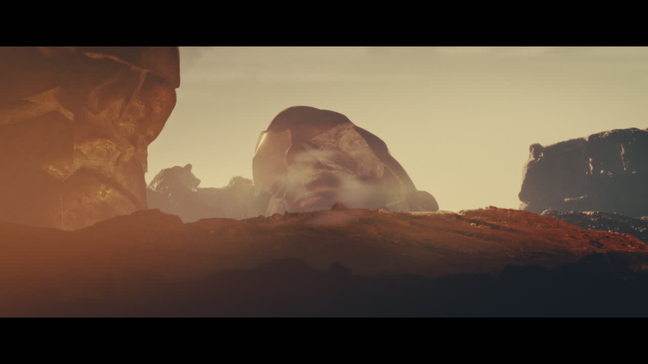 Huge golden statues in the desert during sunset