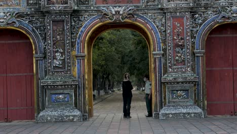 woman talks to security guard refused entry citadel complex, hue, vietnam