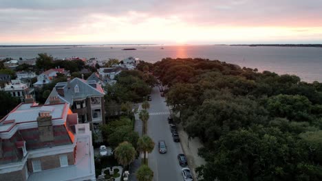 aerial pan at sunrise of historic homes in charleston sc, south carolina