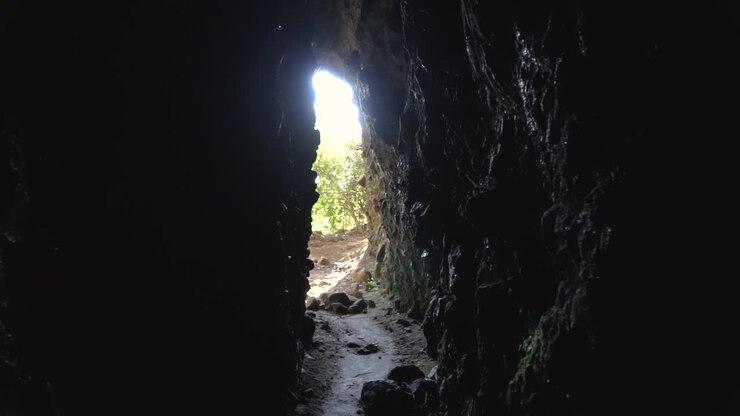 SLOWMO - Walking through narrow lava cave tunnel in New Zealand
