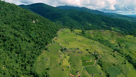 4k cinematic nature aerial drone footage of the beautiful mountains and paddy fields of ban pa pong piang at doi ithanon next to chiang mai, thailand on a sunny day