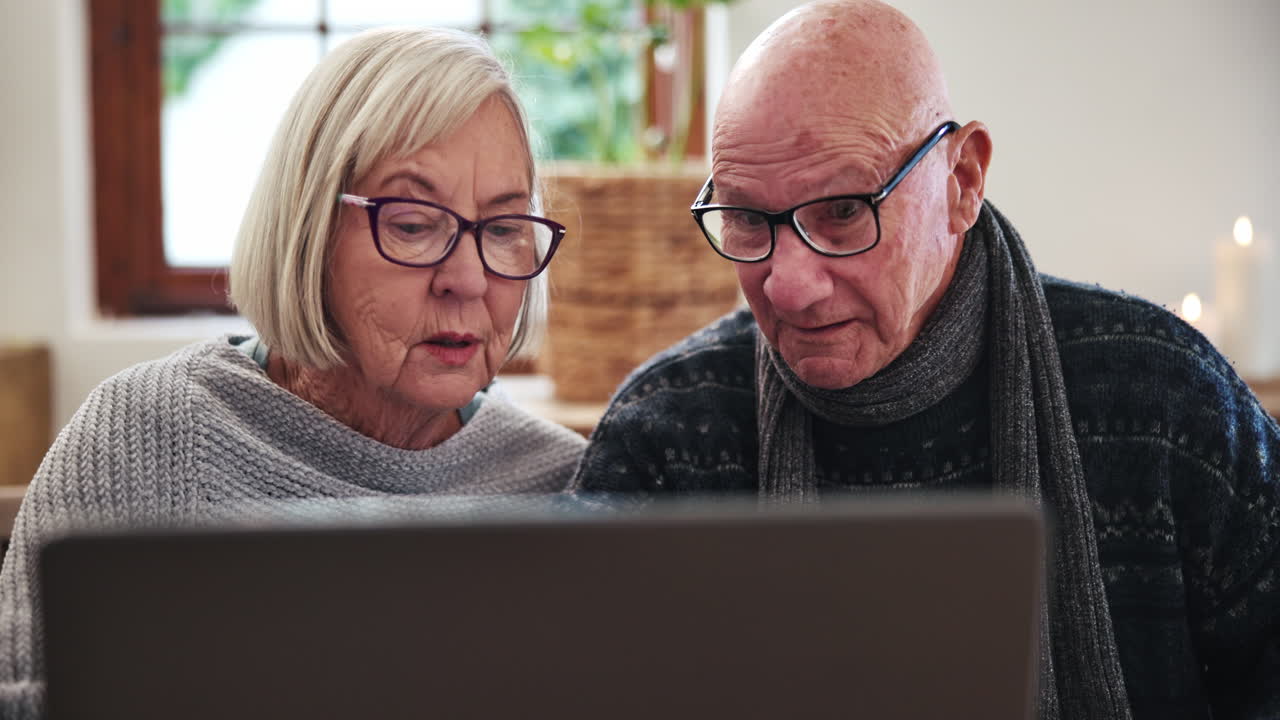 Senior, couple and laptop with discussion