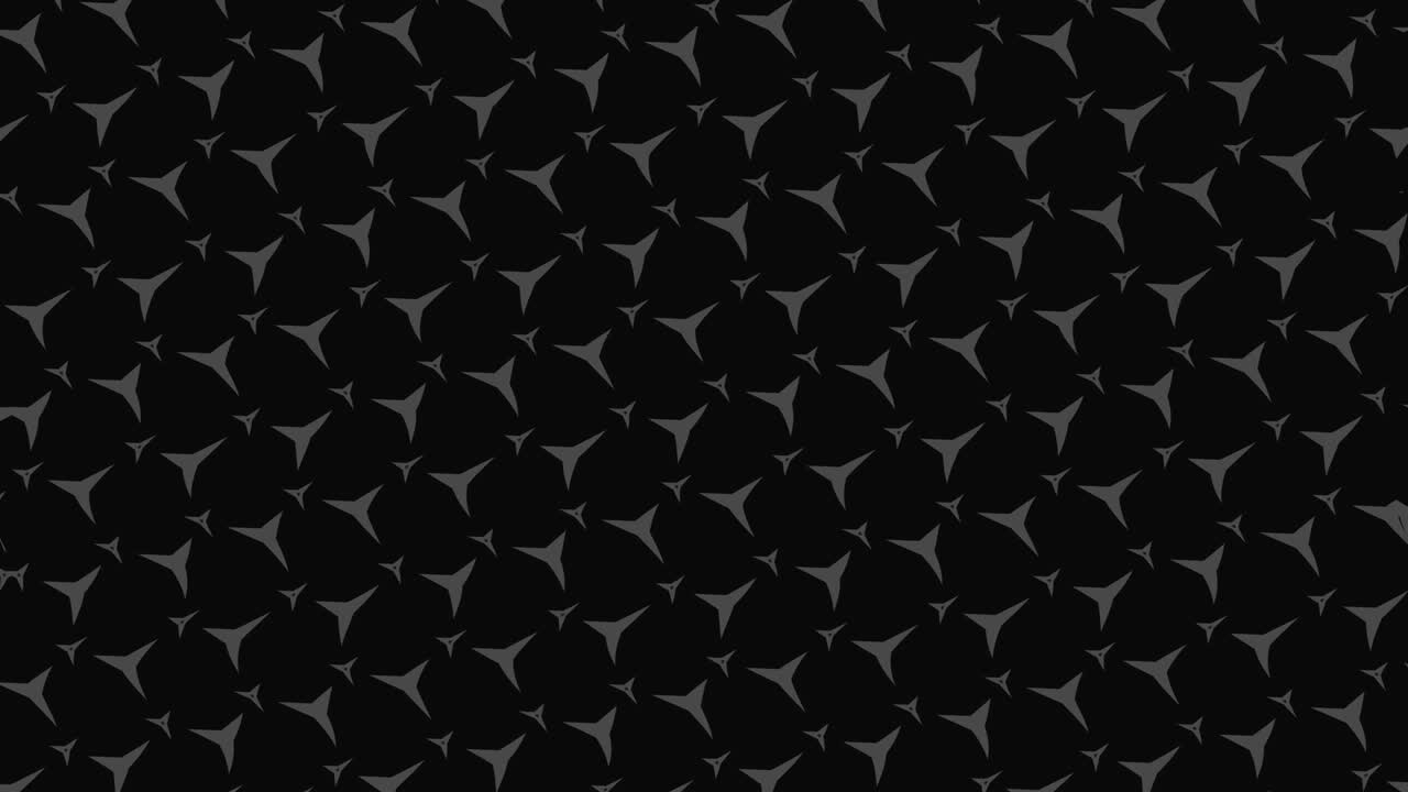Colored pattern on a minimal black background.
