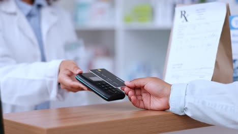 closeup of customer using contactless payment